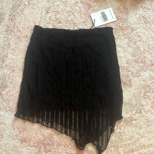 Black lace mini skirt
